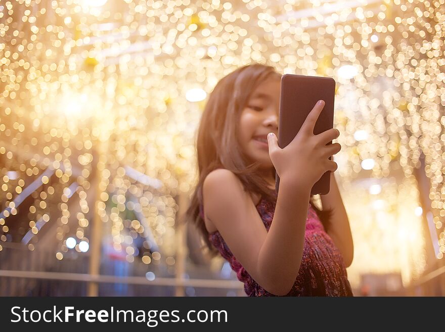 Asian kids selfie live chat with mobile phone