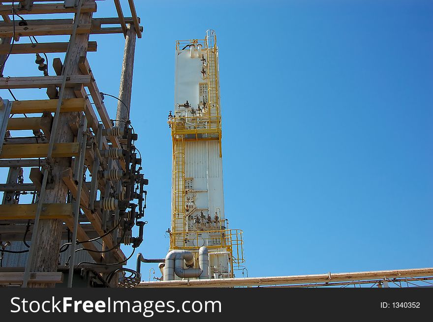 Factory tower for processing oil and gas. Factory tower for processing oil and gas