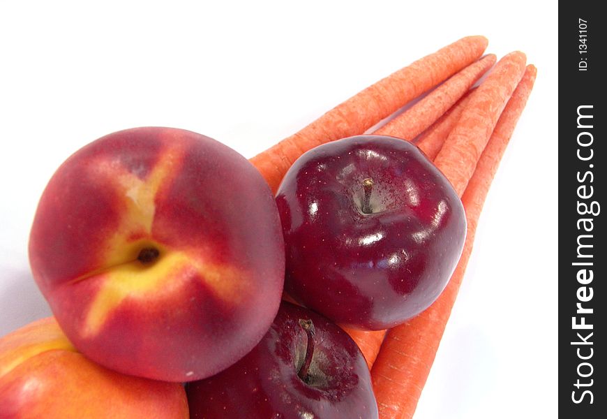 Healthy vegetables and fruits (Apples, Carrots and Peaches)