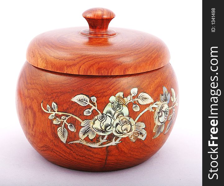 Wooden jug with  flower pattern of shell