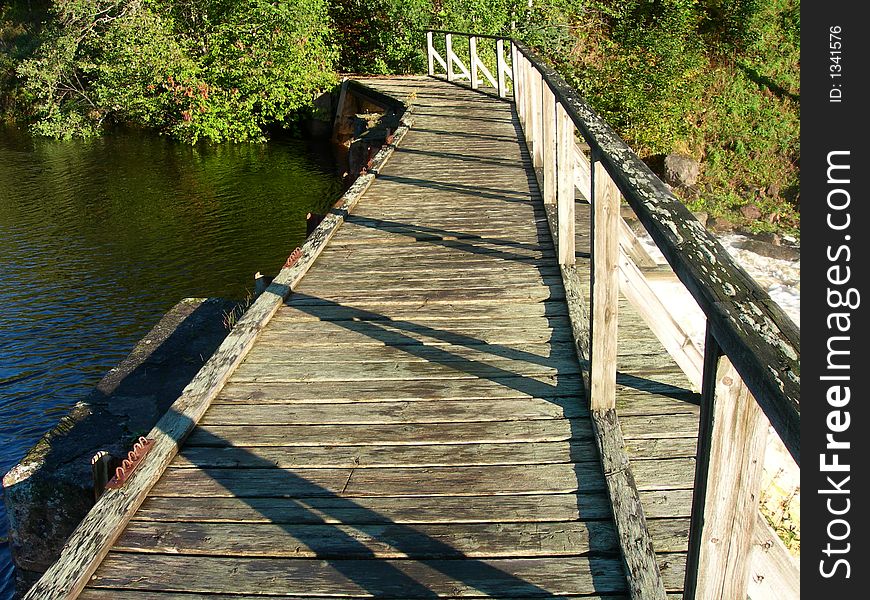 Old wooden bridge in Fossum in Norway