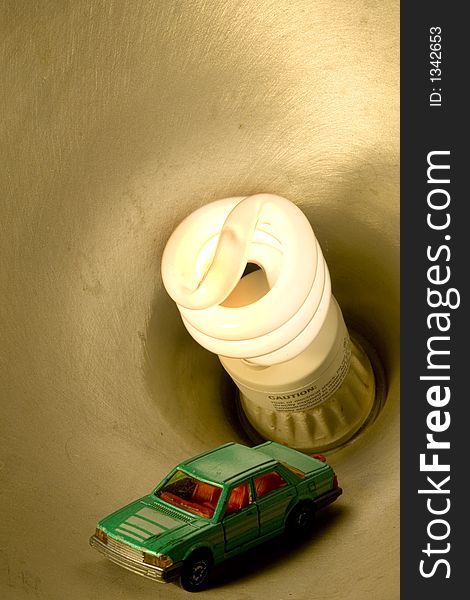A toy car with a lightbulb. A toy car with a lightbulb.