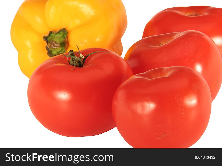 Tomatoes and paprica, isolated on black background