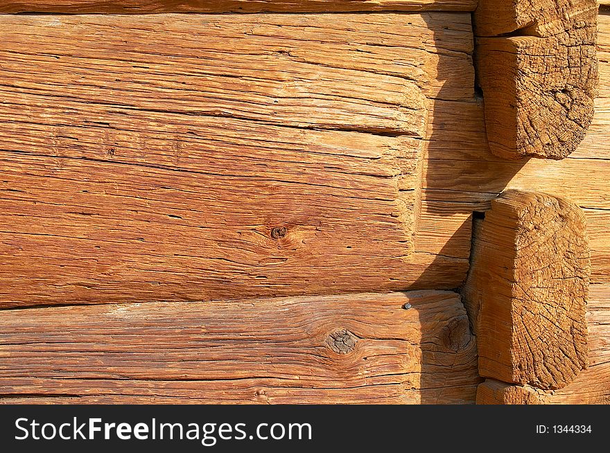 Aged logs in the wall. Aged logs in the wall