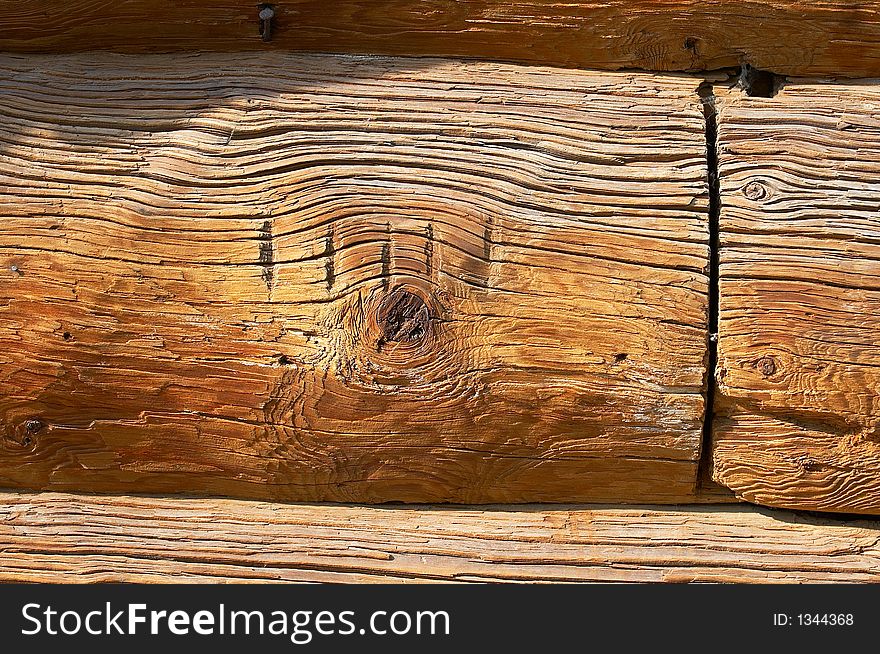 Aged logs in the wall. Aged logs in the wall