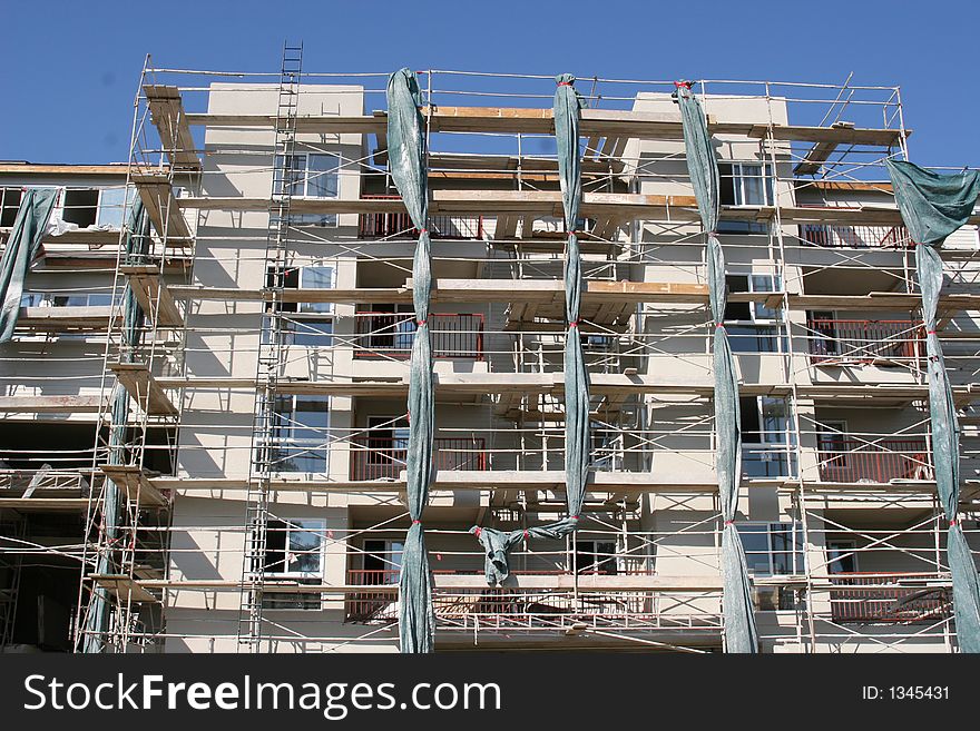 Apartment building in framing stage. Apartment building in framing stage.