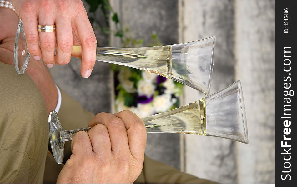 Shortly married couple drinking a glass of champagne together. Shortly married couple drinking a glass of champagne together