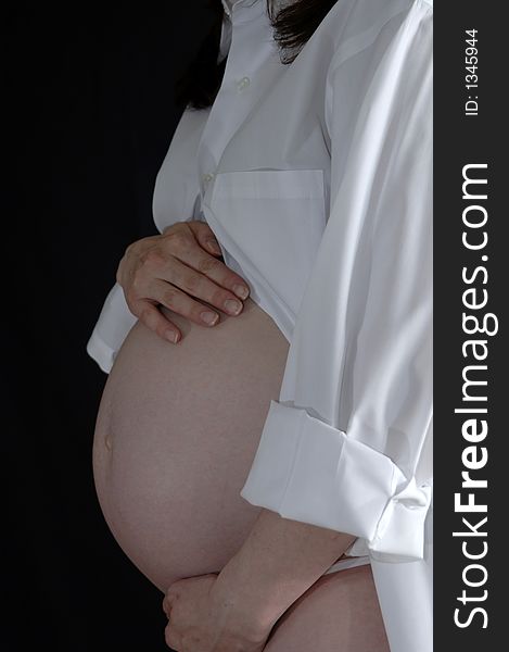 Pregnant women with hands on tummy. Pregnant women with hands on tummy