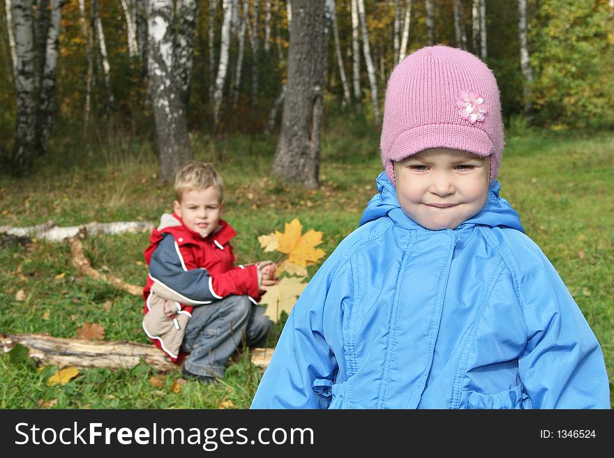 Children in mood in autumn park