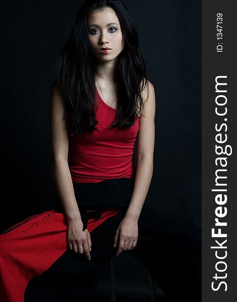 Beautiful Asian girl in red outfit. Beautiful Asian girl in red outfit