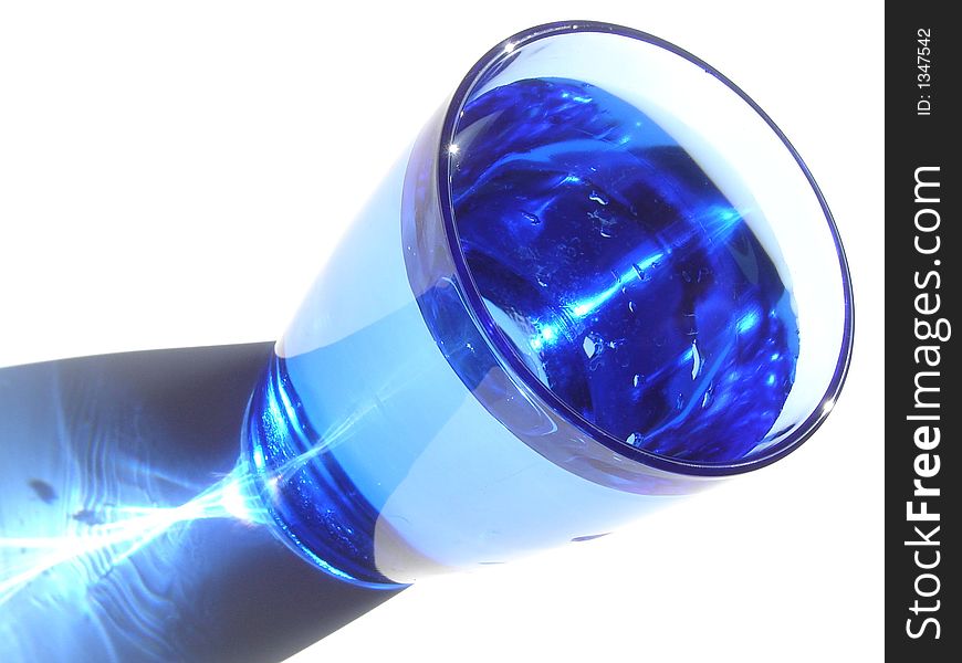 Isolated blue glass of water
