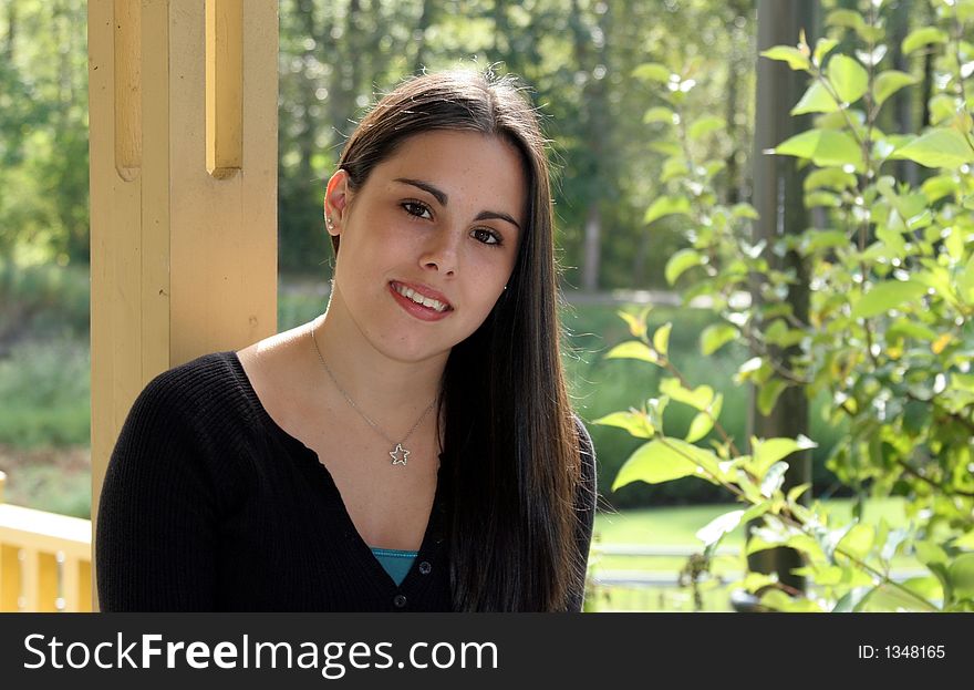 A very pretty teenage girl modeling for a photo shoot. A very pretty teenage girl modeling for a photo shoot.