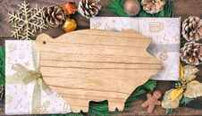 Christmas Preparations, Cutting Board In The Form Of Pigs, Fir Branches, Cones And Decorations. New Year Of The Pig On The Chinese Stock Image