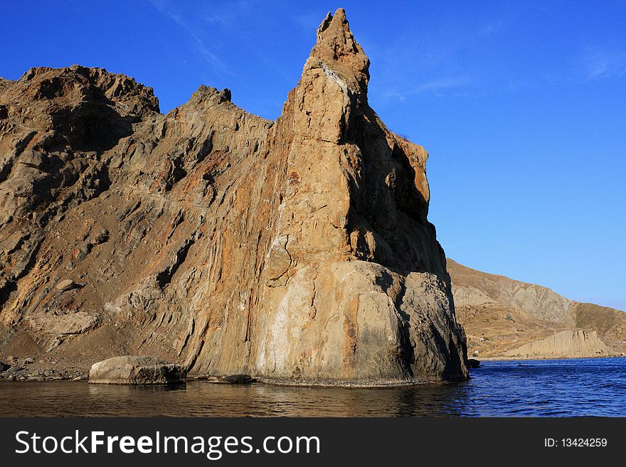 Seascape - a beautiful rock, sea and sky. Seascape - a beautiful rock, sea and sky