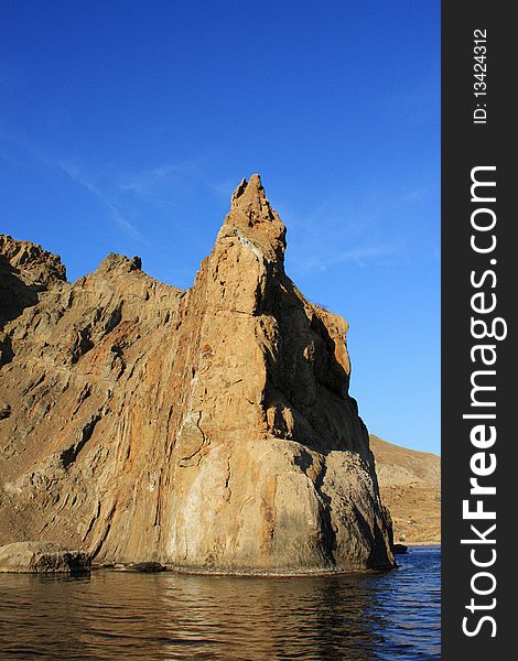 Rock In The Sea - Vertical Image