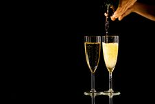 Bottle And Glasses Of Champagne Toasting For New Year Romantic Celebration And Special Moments Royalty Free Stock Photos