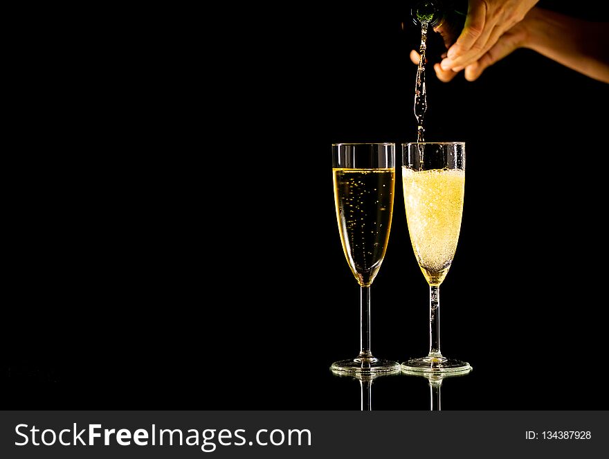 Bottle and glasses of Champagne toasting for New year Romantic Celebration and Special moments