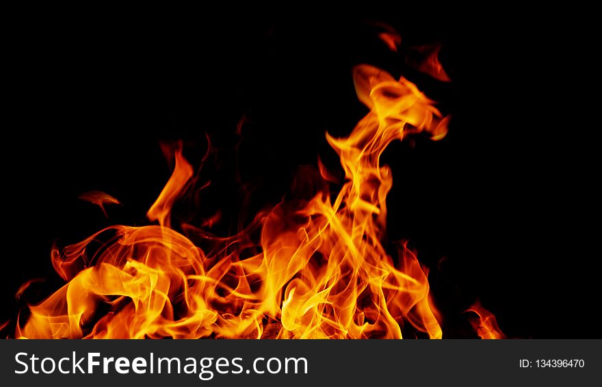 Fire Flames On Abstract Black Background,