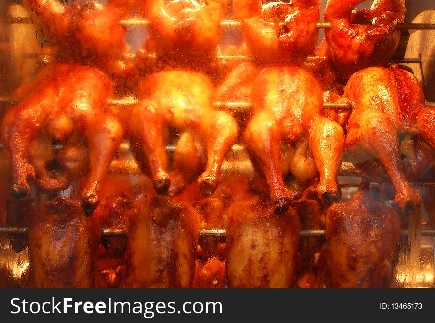 Chicken being grilled on the market in Amsterdam. Chicken being grilled on the market in Amsterdam