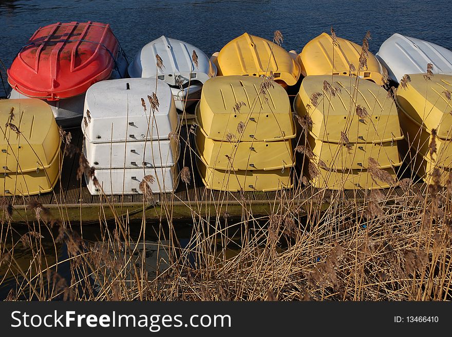 Colorfull botes upside down in a harbour. Colorfull botes upside down in a harbour