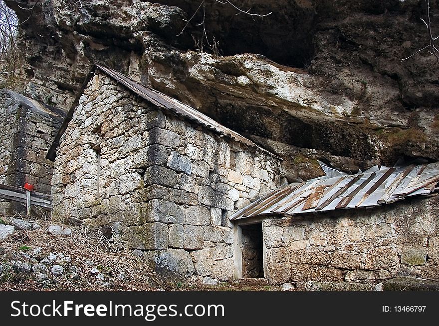 Old houses in Paklenica National park in Croatia, where people lived in the past. Houses are special for buing built under the rocks as their natural shield.