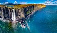Aerial View Of The Dramatic Coastline At The Cliffs By Staffin With The Famous Kilt Rock Waterfall - Isle Of Skye - Stock Photography