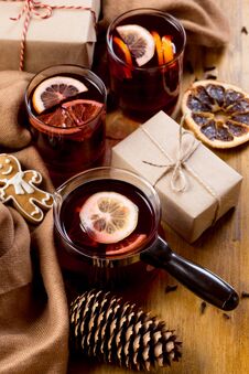 Mulled Wine In Glass Mug With Spices. Christmas Hot Drink On Wooden Table. Top View Royalty Free Stock Photography