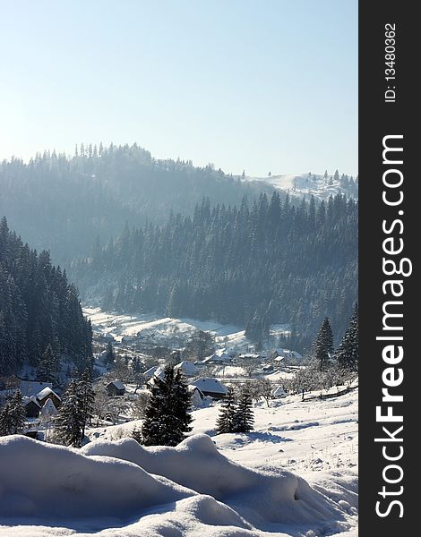 Small village in Transylvania covered in snow. Small village in Transylvania covered in snow