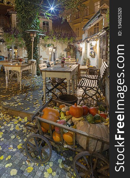 PRAGUE, CZECH REPUBLIC - OCTOBER 17, 2018: The autumn nicht atmosphere on the yard of restaurant in Little quarter.