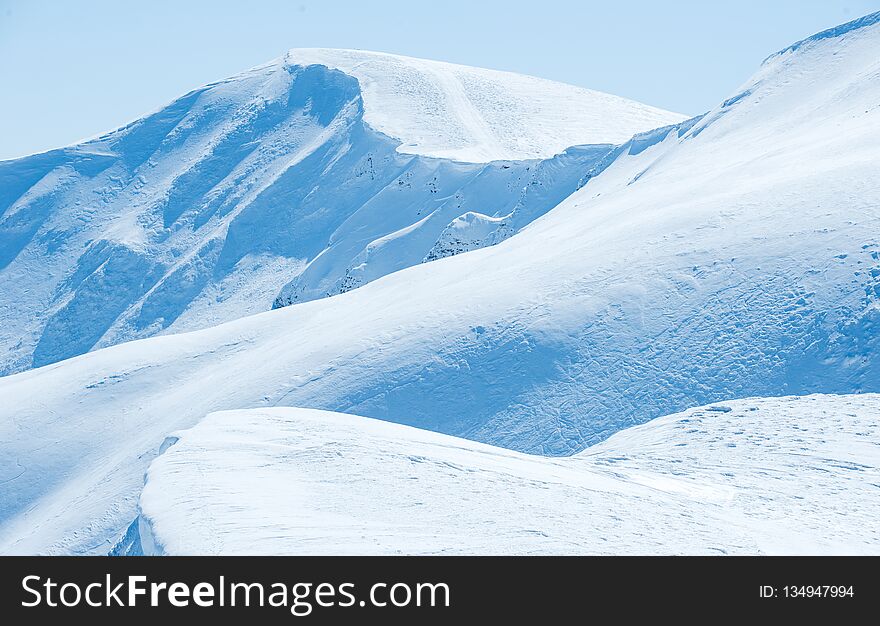 Snow-capped peaks of the Carpathian mountain range of Europe. Snow-capped peaks of the Carpathian mountain range of Europe
