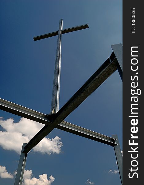 Steel cross on the top of an observation tower. Steel cross on the top of an observation tower.