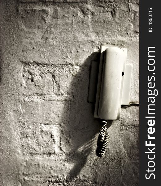 Portrait photo of phone on distressed wall