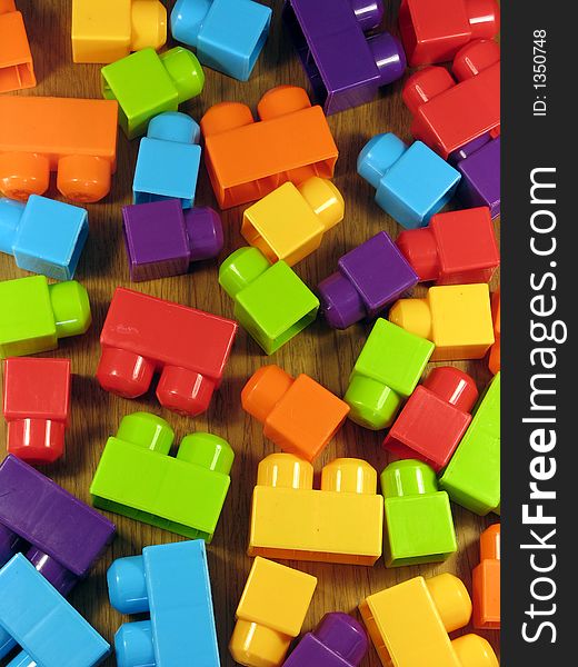 Brightly coloured plastic building blocks.