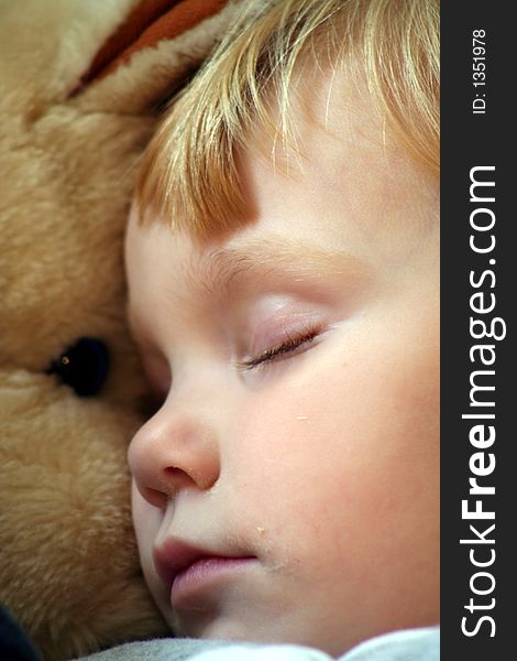 This little girl fell asleep with her favorite stuffed animal. This little girl fell asleep with her favorite stuffed animal.