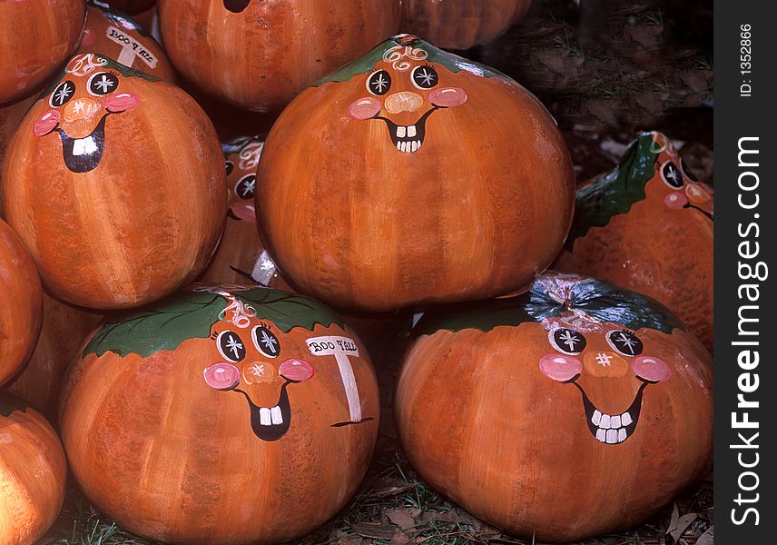 Pumpkins decorated for the holidays with a smile. Pumpkins decorated for the holidays with a smile