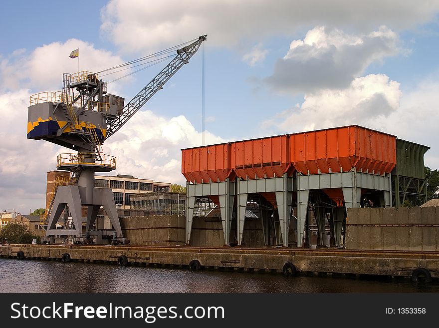 Large crane for loading ships on a canal. Large crane for loading ships on a canal