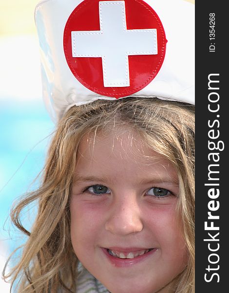 Cute little girl playing nurse