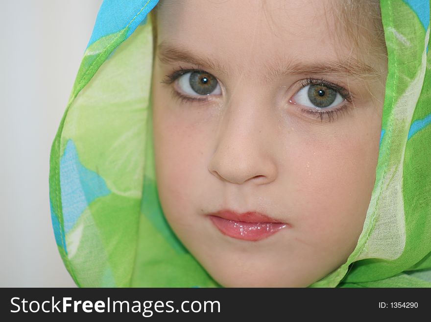 Beautiful young child with scarf. Beautiful young child with scarf