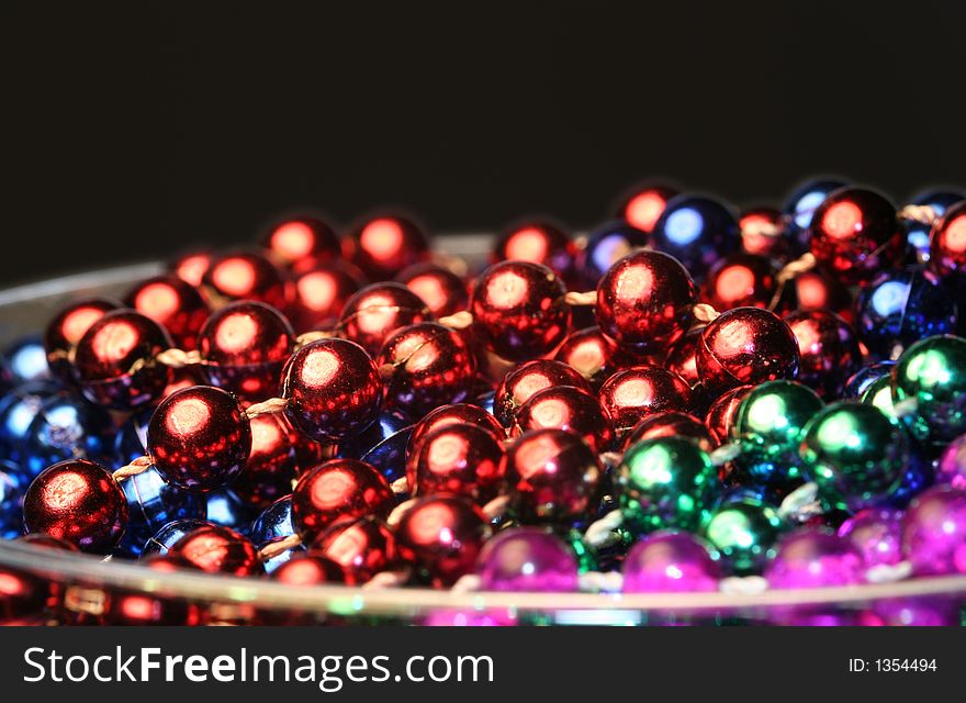 Close-up of colorful beads, christmas decorations. Close-up of colorful beads, christmas decorations