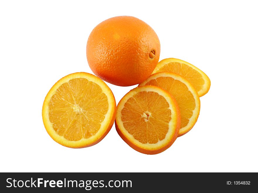 An orange sliced in half next to a whole orange. An orange sliced in half next to a whole orange