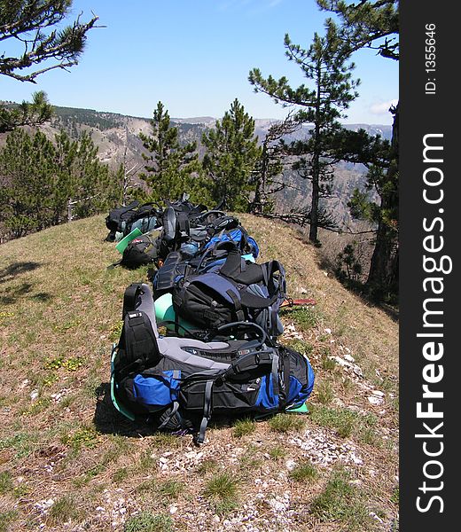 A few knapsacks that lay out on the top of mountain (Crimea)