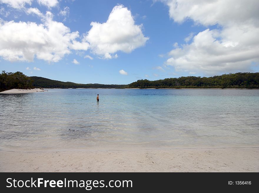 Single persone bathing in lake McKenzie (Fraser Island, Australia). Single persone bathing in lake McKenzie (Fraser Island, Australia)