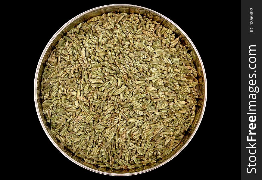 A selection of cooking spices on a plain background