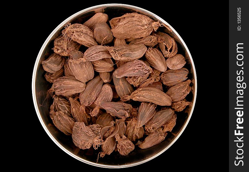 A selection of cooking spices on a plain background