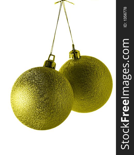Two gold christmas balls isolated over white background. Two gold christmas balls isolated over white background