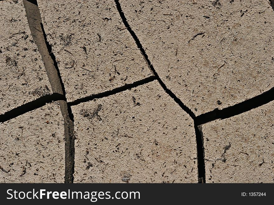 Dry cracked earth texture background. Dry cracked earth texture background