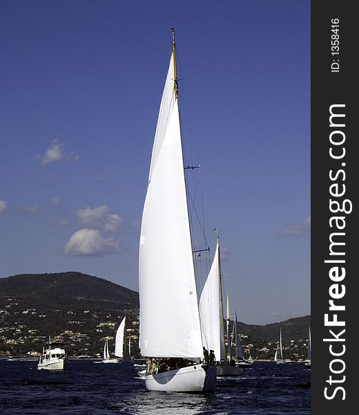 Classic sailing yawl Mariella from 1938 by Fife putting up sails