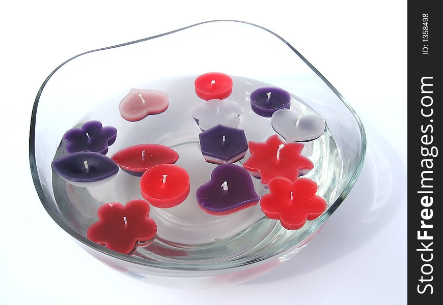 Floating candles in a bowl with water