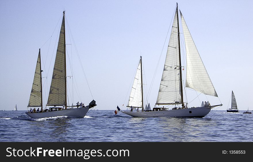 Two classic sailing yachts heading out to Nioularge