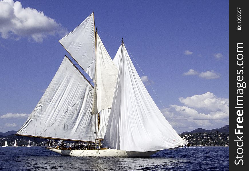 Classic sailing yacht Lulworth of 1920 with all sails out, awaiting he wind